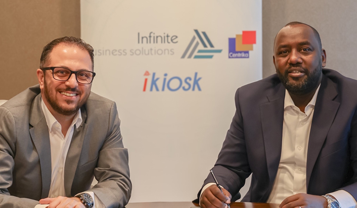 Mohammad Al-Azzeh, the Managing Partner at IBSand Willy Claude Karasira, Co-founder and Executive Director of Centrika during the signing of the agreement in Kigali.